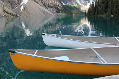 Boats in calm lake