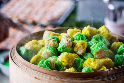 Close-up of vegetables in basket on table