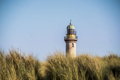 Low angle view of lighthouse against clear sky