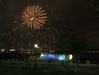 Firework display at night