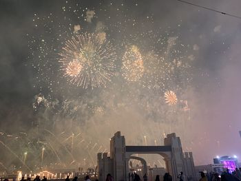 Firework display at night