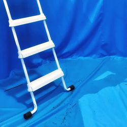 Close-up high angle view of blue wall