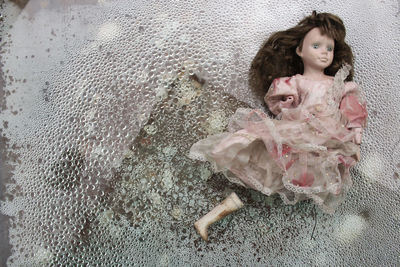 Portrait of smiling girl lying on floor