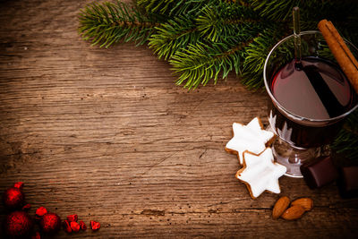 High angle view of mulled wine and food on table