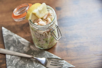 High angle view of drink in glass jar on table