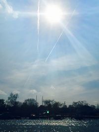 Low angle view of vapor trails in sky