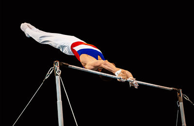 Low angle view of man performing acrobat