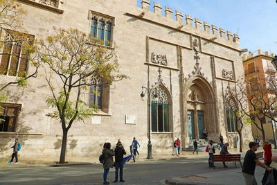 Group of people in front of building