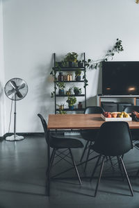 Potted plants on table at home