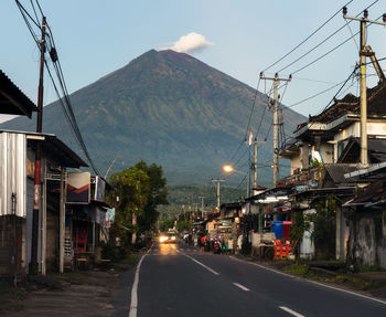 Road through the amed village in bali, karangasem district towards mount agung volcano in indonesia