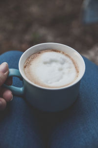 Close-up of coffee cup on table