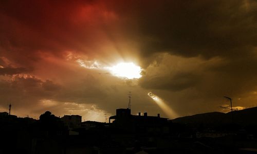 Sun shining through clouds