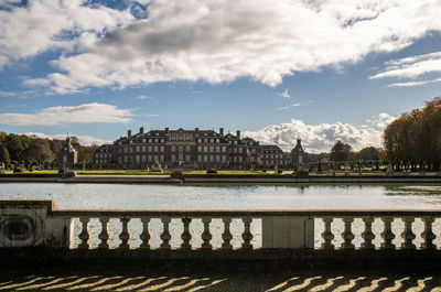 Bridge over river against sky