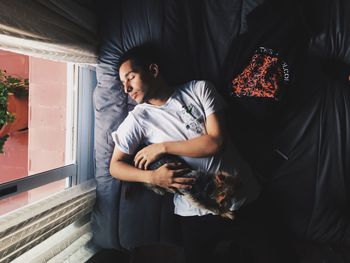 Young woman with cat