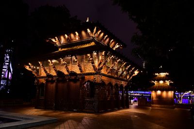 Illuminated building at night