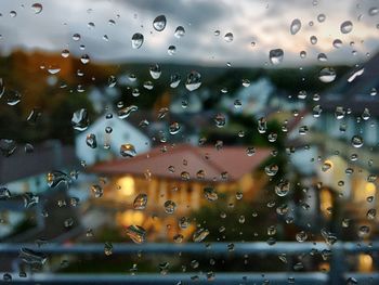 Full frame shot of raindrops on window