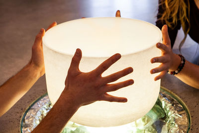 High angle view of people holding hands