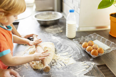 Midsection of woman preparing food