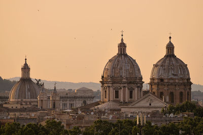 View of buildings in city against sky