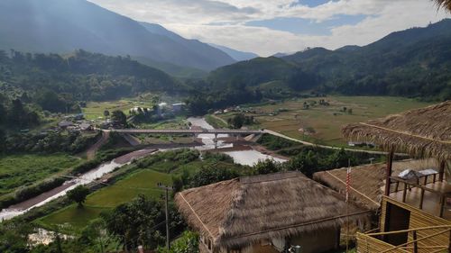 High angle view of agricultural field against mountains