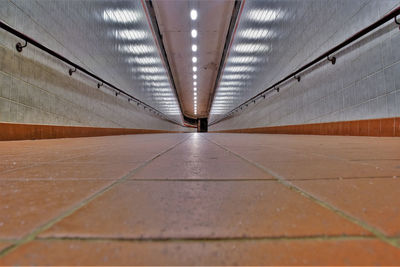 Surface level of illuminated underground walkway