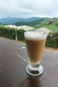 Close-up of coffee served on table