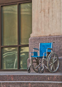 Bicycle against wall of building