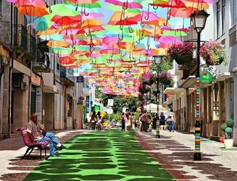 building exterior, architecture, street, built structure, men, person, multi colored, city, walking, city life, lifestyles, market, large group of people, umbrella, market stall, day, sunlight, leisure activity, outdoors