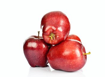 Close-up of apple against white background