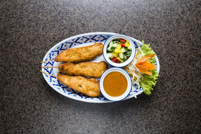 High angle view of meal served on table
