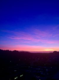 Scenic view of silhouette landscape against romantic sky at sunset