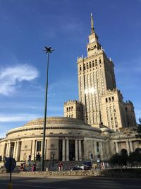 Low angle view of government building against blue sky