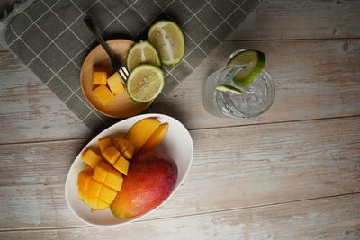 High angle view of orange fruit on table