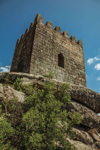 Low angle view of old building against sky