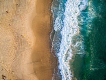 Directly above view of shore at beach