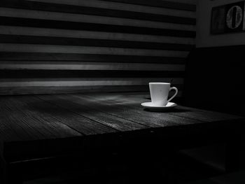 Close-up of coffee cup on table