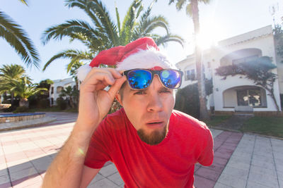 Portrait of young man wearing sunglasses