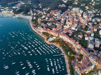 Aerial view of harbor by city