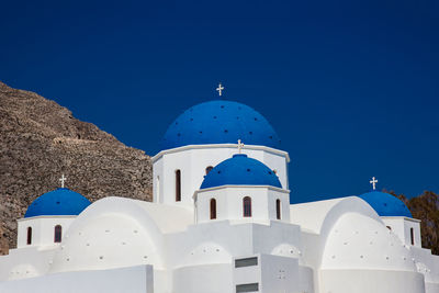 The church of holy cross in the central square of perissa on santorini island