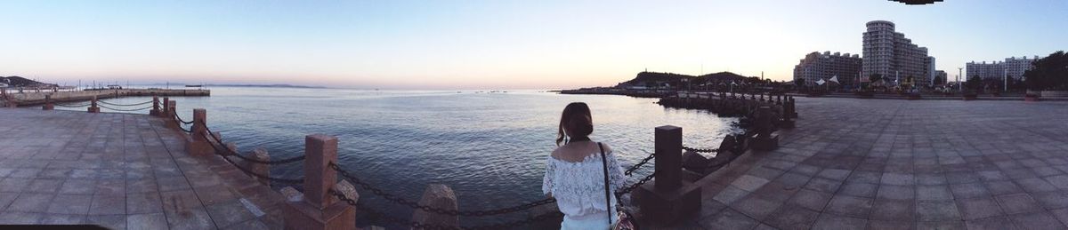 Panoramic view of sea against sky during sunset