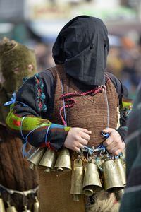 Rear view of man wearing mask