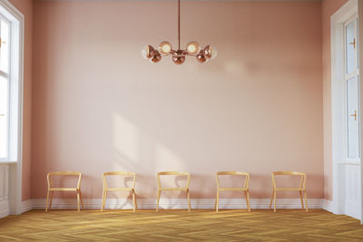 Empty chairs on table at home