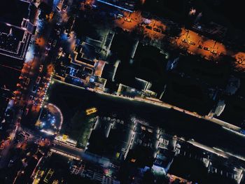 High angle view of illuminated cityscape at night