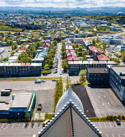 Overview of icelandic capital from hallgrímskirkja church. church roof in foreground.
