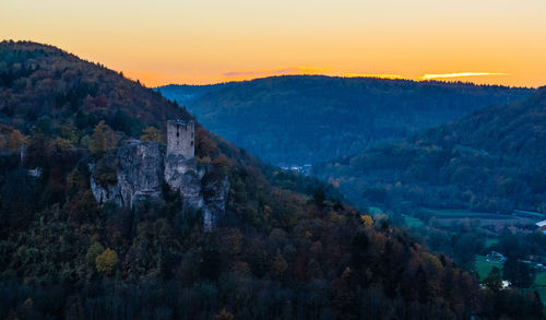 Scenic view of mountains against sky during sunset