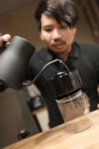 Portrait of man holding ice cream