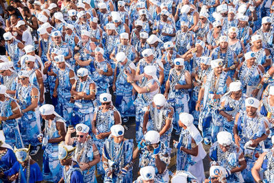 Crowd of the traditional carnival block filhos de gandy are seen in castro alves square 