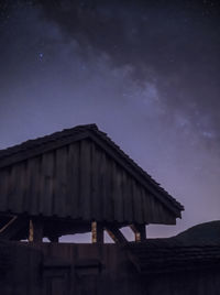 Low angle view of building against sky at night