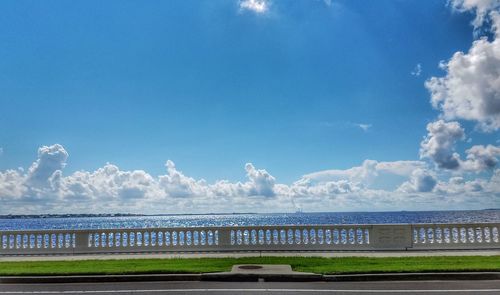 Scenic view of sea against blue sky