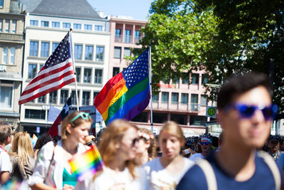 Group of people in front of buildings